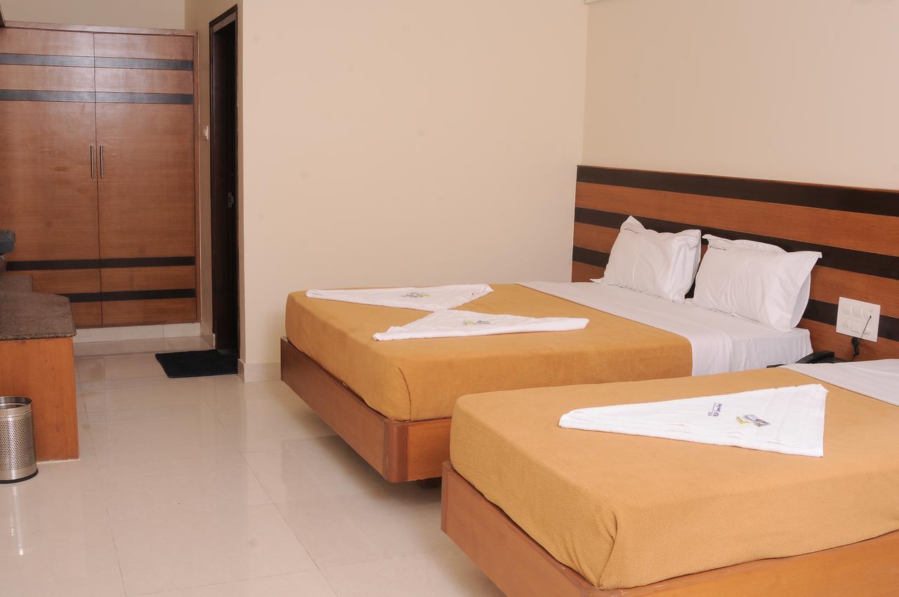 Hlv Grand Inn Bangalore Extérieur photo