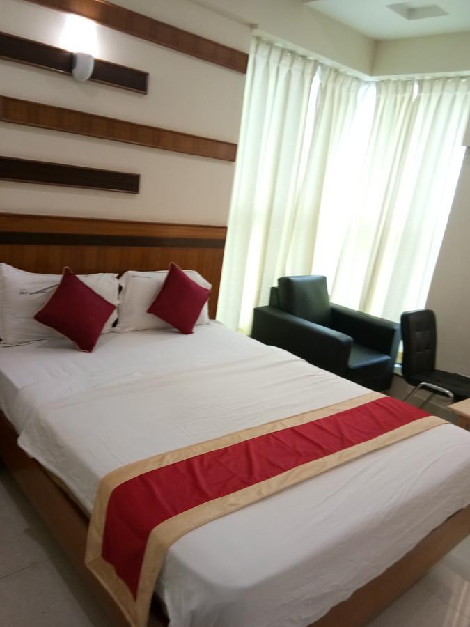Hlv Grand Inn Bangalore Extérieur photo