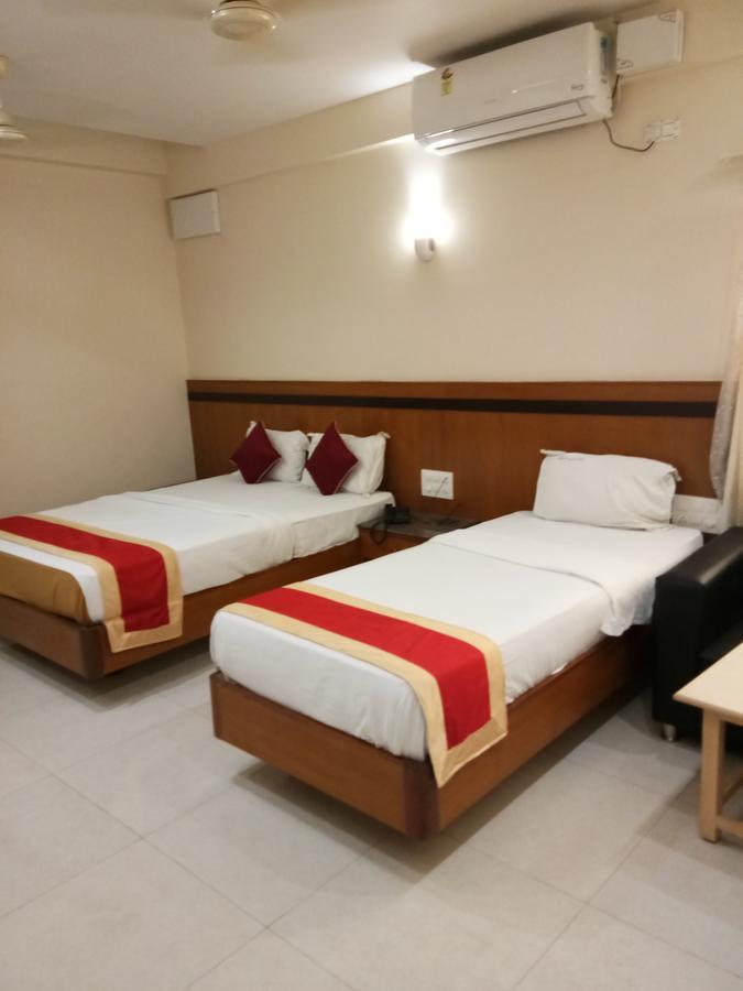 Hlv Grand Inn Bangalore Extérieur photo