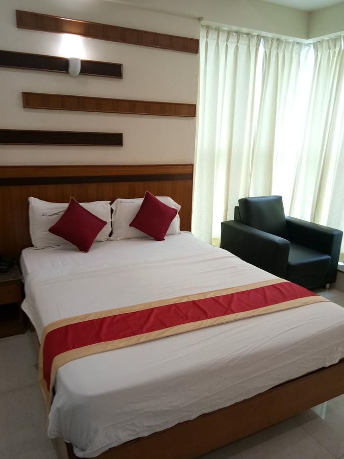 Hlv Grand Inn Bangalore Extérieur photo