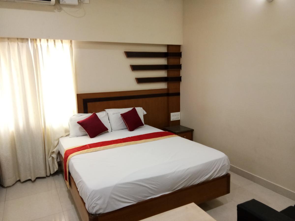 Hlv Grand Inn Bangalore Extérieur photo