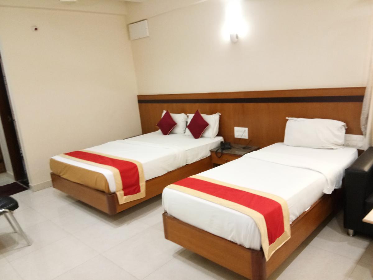 Hlv Grand Inn Bangalore Extérieur photo